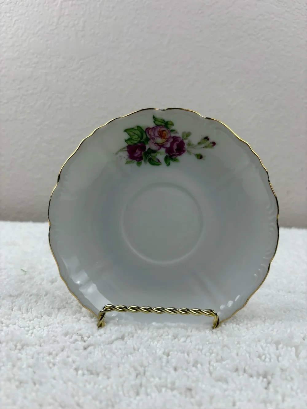 Vintage Porcelain Teacup & Saucer Set Featuring Pink Roses on a White Background